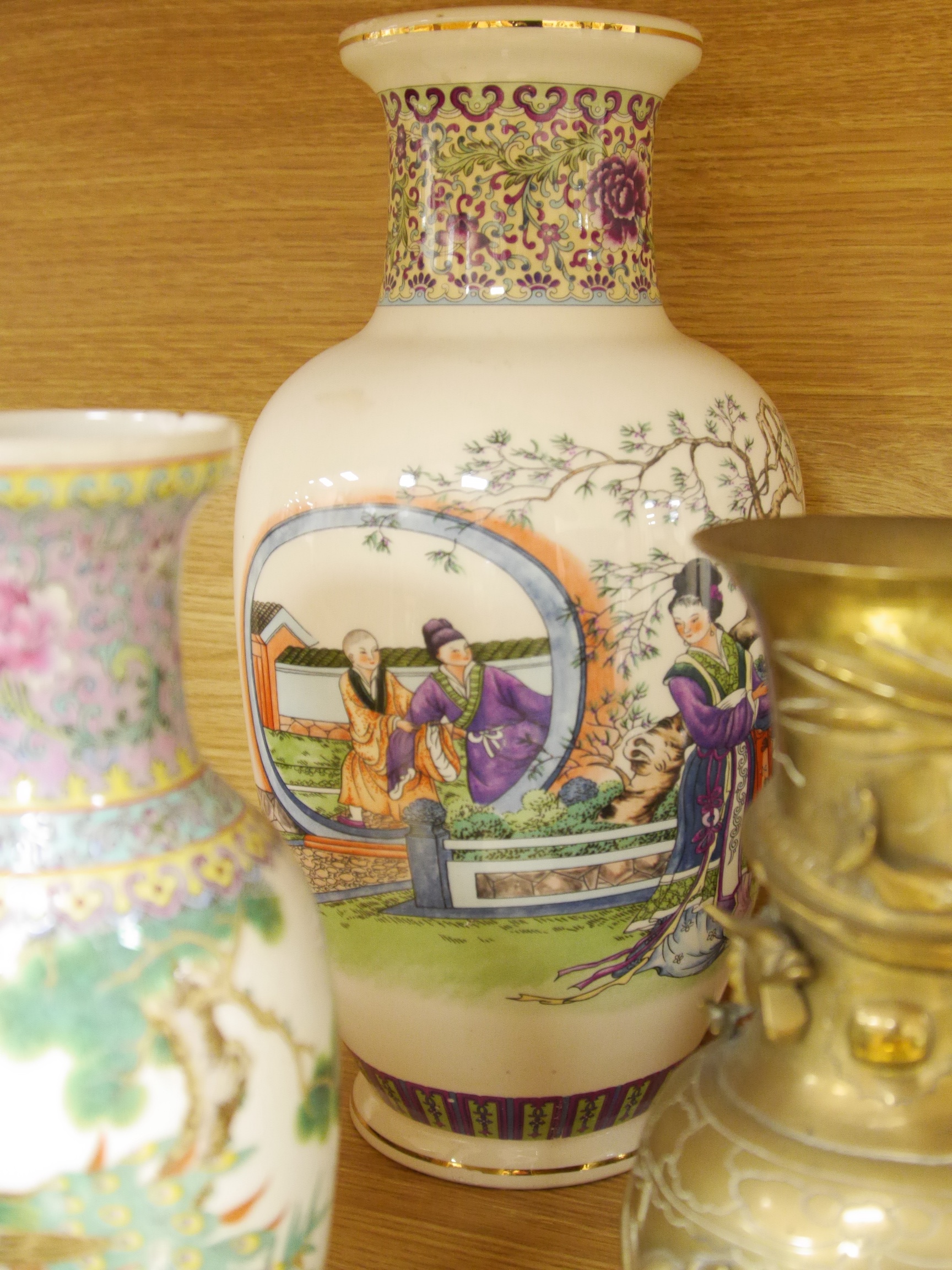 A large quantity of Chinese and Japanese ceramics and metalware to include Imari plates, blue and white vases and brass dishes, largest 37cm high. Condition - mostly fair to good